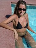 Long Haired Lori Anderson In Black Bikini And Sunglasses Shows Off Her Hairy Arms In The Pool