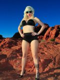 Blonde Haired Alternative Model Lynn Pops Dressed In Black Poses In The Mountains