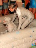 Christina Lee And Her Opponent Bare Their Lovely Boobies During Public Muddy Wrestling